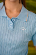 Hole in one polo knit top