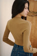 Stiching turtle neck wool top in caramel