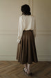 Level up the look faux leather skirt in brown with belt