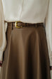 Level up the look faux leather skirt in brown with belt